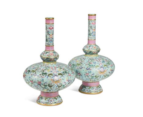 A pair of Chinese porcelain pedestal vases, Qianlong seal marks but Republic, the duck-egg blue ground with detailed floral s