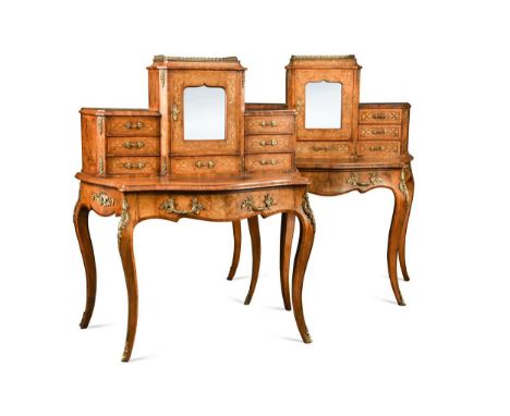 A near pair of burr walnut Bonheur Du Jour, circa 1860, each with raised superstructure comprising of an assortment of seven 