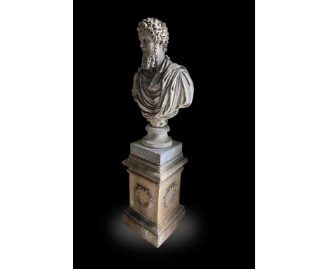 A marble bust of the Emperor Lucius Verus, 18th or 19th century,  the weathered bust surmounted on an unassociated pedestal b