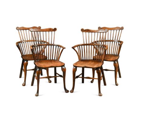 Four George III stick back elm and beech armchairs,  with saddle shaped seats and cabriole front legs united by an H-shaped s