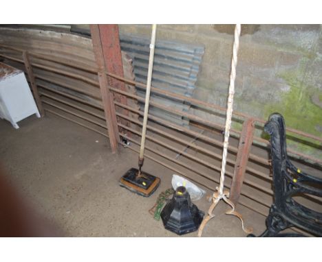 A  rain hopper; a metal stand etc. 