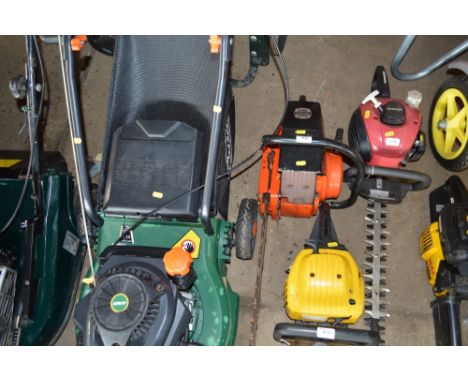A Dolma petrol chainsaw 