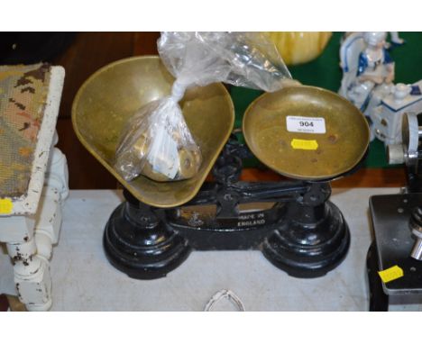 A set of kitchen scales and weights
