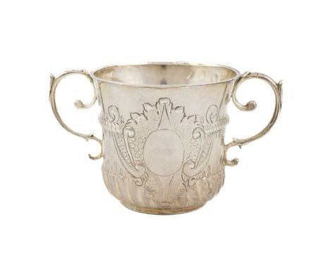 A George I silver two-handled porringer,by Timothy Ley, London 1714, circular form, part-fluted decoration, central gadrooned