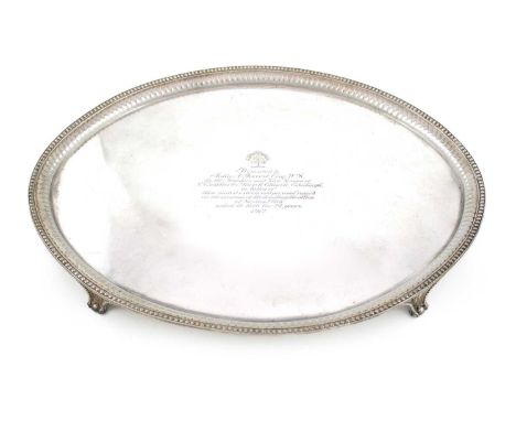 A Scottish silver presentation salver,by Hamilton &amp; Inches, Edinburgh 1911,oval form with a lobed and beaded border, engr
