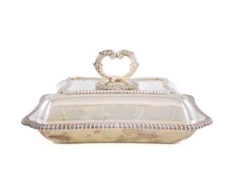 A silver entree dish and cover,by Thomas Bradbury, London 1923,shaped rectangular form, gadroon border, the pull-off cover wi