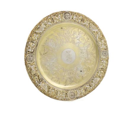 A Victorian silver-gilt waiter,by Stephen Smith &amp; Son, London 1882,circular form, with a cast and pierced vine and lion b