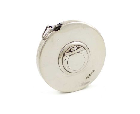 An Edwardian silver tape measure,by James Chesterman &amp; Co., Sheffield 1905,plain circular form, push-button clasp for the