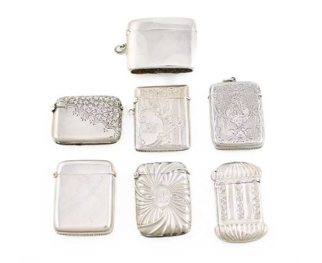 A collection of seven silver vesta cases, various dates and makers, comprising: a Victorian one of shaped rectangular form, e