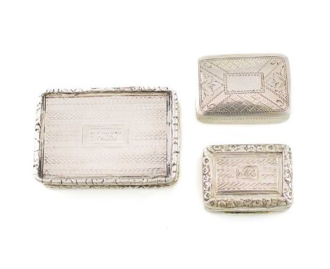 A collection of three antique silver vinaigrettes,rectangular form with engraved and engine-turned decoration, comprising: a 