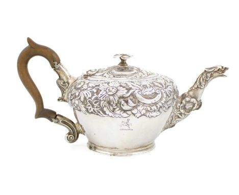 A William IV silver teapot by The Barnards, London 1833, tapering circular form, chased foliate decoration on a matted backgr