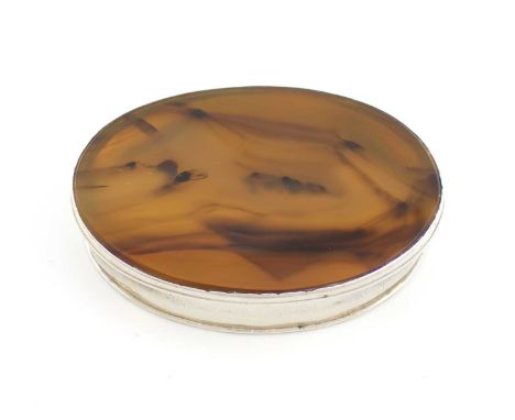 An 18th century silver-mounted agate snuff box,unmarked circa 1730-40,oval form, gilded interior, the hinged cover set with a