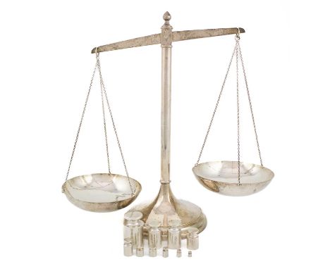 A pair of modern silver balance scales and weights,by Mappin and Webb, London 1992, central hinged pivot with two arms each s