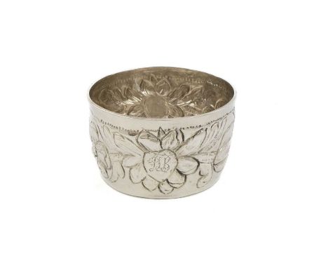 A Charles II provincial silver tumbler cup/beaker, no apparent maker's mark, York 1675, circular form, embossed foliate decor