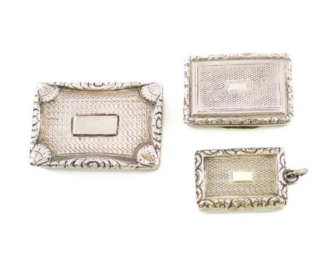 A collection of three George IV silver vinaigrettes,comprising: one by William Simpson, Birmingham 1821, scroll and shell bor