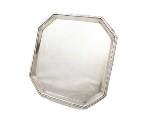 A silver waiter,by M Beaver Ltd, Sheffield 1937,square form, canted corners, moulded edge with engraved decoration, later ins