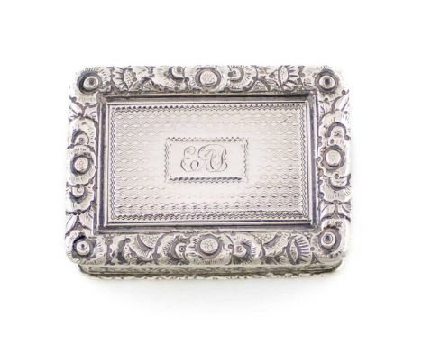 A George IV silver vinaigrette,by Thomas Edwards, London 1825,rectangular form, foliate borders, hinged cover with engraved i