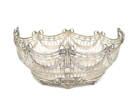 A silver basket,by C S Harris &amp; Sons Ltd, London 1912,pierced tapering oval form, decorated with ribboned garlands, pierc