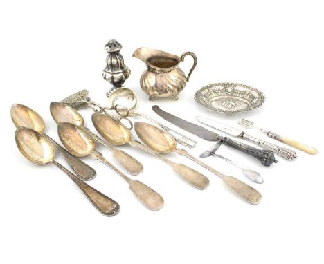 A mixed lot of continental and English silver,comprising: a German jug, a pierced and embossed dish, an Austro-Hungarian pepp