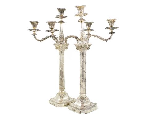 A pair of Victorian silver three-light candelabra, by Horace Woodward & Co., London 1888, Corinthian columns with spiral foli