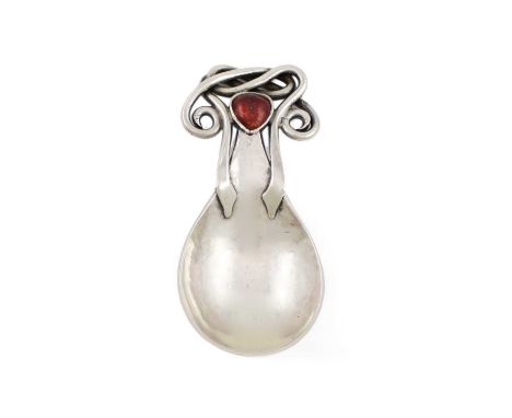 By Omar Ramsden & Alwyn Carr, an Arts and Crafts silver caddy spoon, London 1904, the bowl with spot-hammered decoration, the