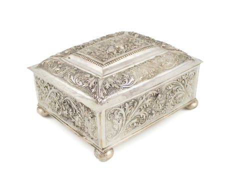 A late-17th century continental silver casket,maker's mark of I.N, IM or IK with flower below,rectangular form, embossed and 