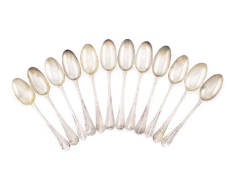 A matched set of twelve 18th century silver Hanoverian teaspoons, two makers, London circa 1760, the reverse of the bowls wit