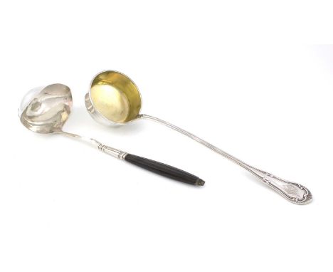 By Georg Jensen, a Danish silver soup ladle, import marks of London 1922, importers marks of Stockwell & Co.,  spot-hammered 