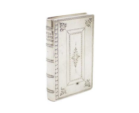 An early-18th century silver snuff box,unmarked, circa 1720,book form, with engraved foliate decoration, inscribed to the spi