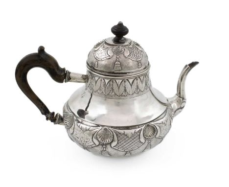 An 18th century Dutch silver teapot, probably by Andries Van der Steen, Haalem 1732, pear form, chased shell fish-scale and f
