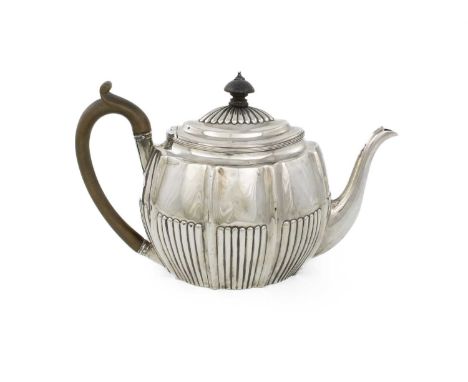 A George III silver teapot, maker's mark over-stamped, London 1801, oval lobed and fluted form, scroll handle, length handle 