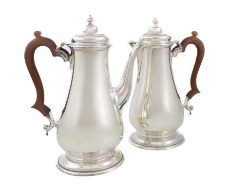 A matched modern pair of silver coffee and hot milk pots,by C J Vander Ltd, London 1962 and 1963,plain baluster form, hinged 