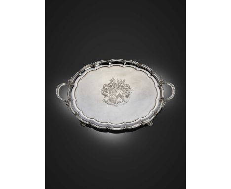 A George IV silver two-handled tray,by Benjamin Smith, London 1825,shaped oval form, scroll border, foliate mounted scroll ha
