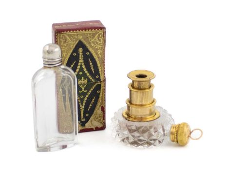 A 19th century French gold and gilt metal mounted spyglass scent bottle, cut glass circular form, with a central gilt metal p