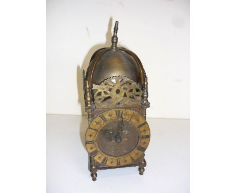 Small brass lantern style clock with wind-up movement 