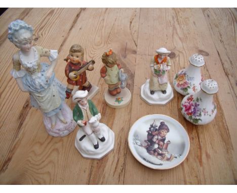 Pair of Hummel/Goebel figures, a pair of Royal Crown Derby pepperettes and other continental decorative ceramic figures 