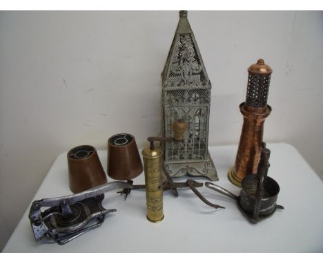 Box containing brass and cooper ware, a lantern in the form of a lighthouse, kitchen squeezer, chip cutter, wrought metal doo