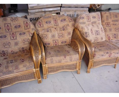 Three piece bamboo &amp; wicker conservatory style suite comprising of two seat sofa and a pair of matching armchairs 