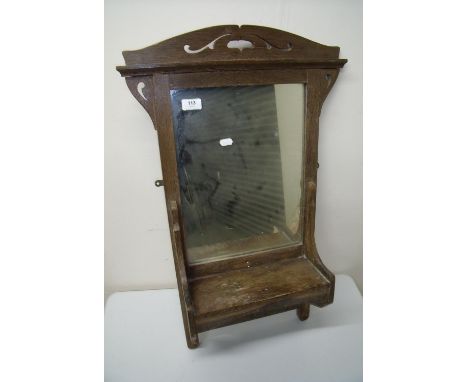 Early 20th C oak wall mirror/shelf (48cm x 75cm) 