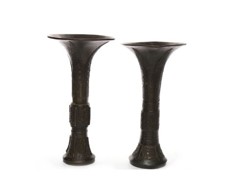 PAIR OF CHINESE BRONZE ARCHAIC STYLE GU VESSELSwith stylised decoration, 24cm high 