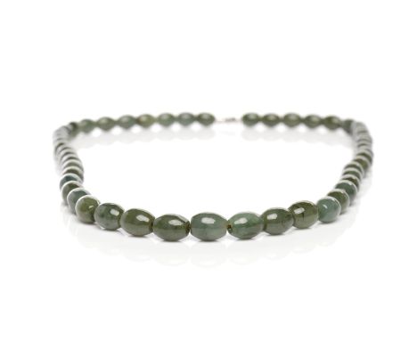 20TH CENTURY CHINESE GREEN JADE NECKLACEwith white metal clasp, each oval bead approx 8mm, the necklace 24cm closed 