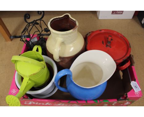 A red enamel flour bin (chips to enamel), a stoneware jug, blue jug etc