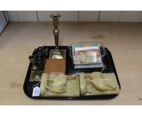 A small box of miscellaneous items to include a framed pierced Indian arch, a J.C. Vickery travel clock, a tub of postcards, 