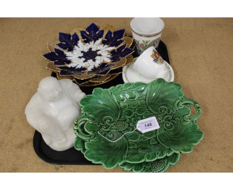 A pair of blue and gilt plates marked with crossed swords (one as found), a white marble Buddha, Victorian enamel 1897 Commem