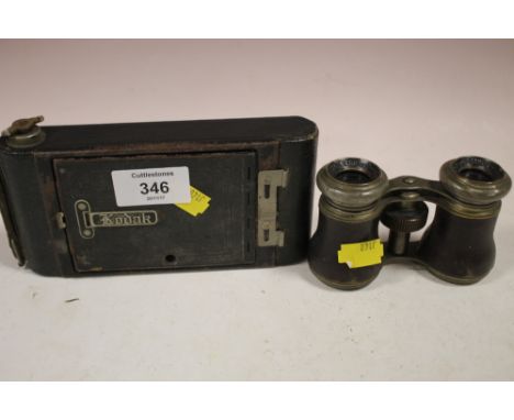 A PAIR OF SPORTING CLUB BINOCULARS TOGETHER WITH A VINTAGE KODAK CAMERA