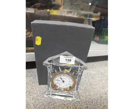 A WATERFORD CRYSTAL CASED MANTEL CLOCK, the architectural case with quartz movement having white dial with Roman numerals, H 