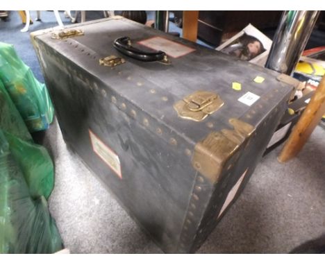 A VINTAGE STUDDED TRUNK/SUITCASE