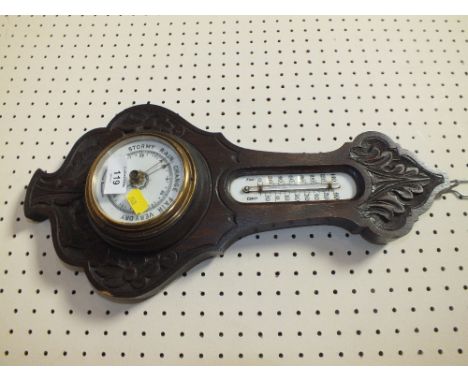 AN OAK WALL HANGING ANEROID BAROMETER 