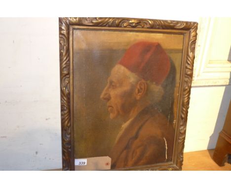 SOLD IN TIMED AUCTION An early 20th century oil on canvas portrait of a clergyman (af) in a giltwood frame 