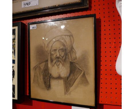 A pencil portrait of an Eastern man, signed, framed and glazed 